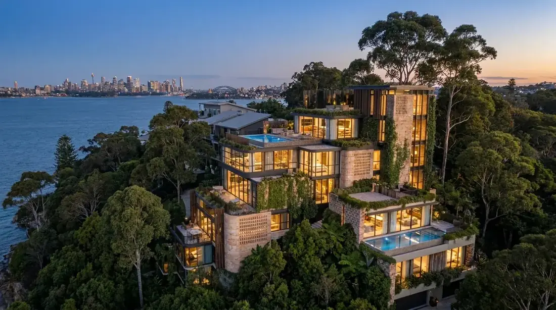 Design visualisation of the Harbour Hillside Residence, a six-level split-level concept dwelling on a treed waterfront headland overlooking Sydney Harbour at dusk